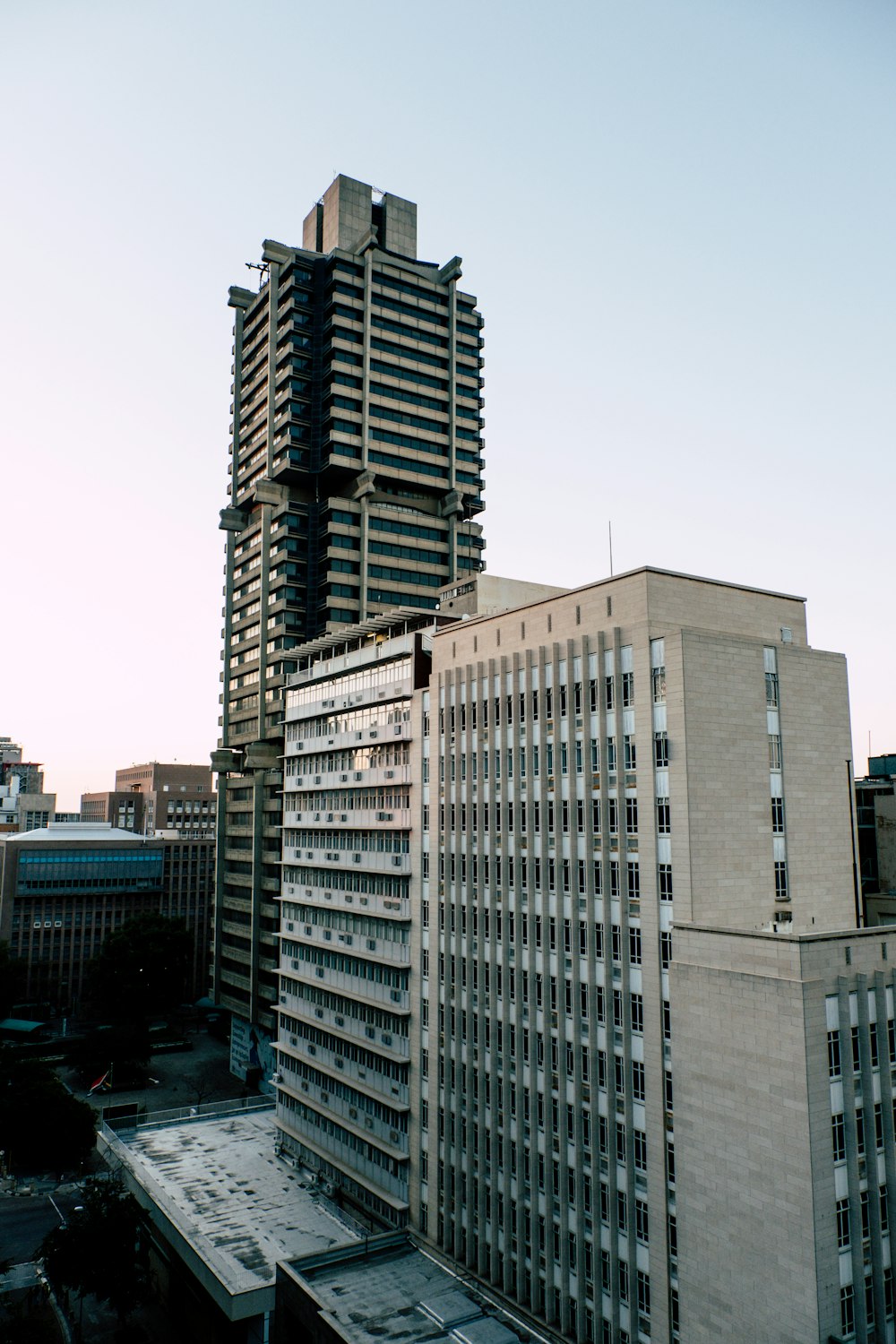 white concrete buildings under blue sky