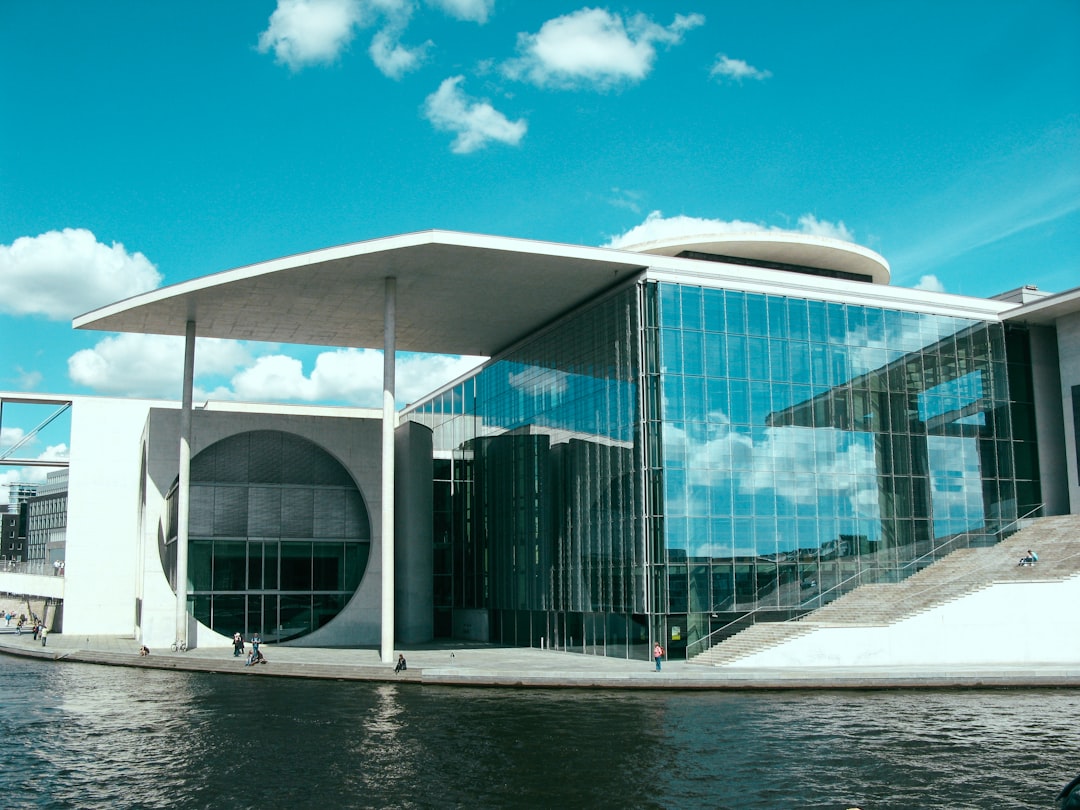 white and curtain glass wall building