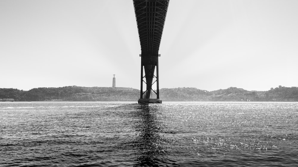 metal bridge and calm water