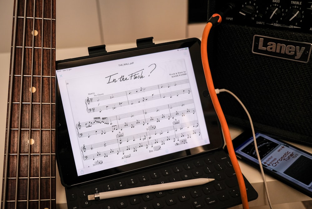 musical note on black laptop computer