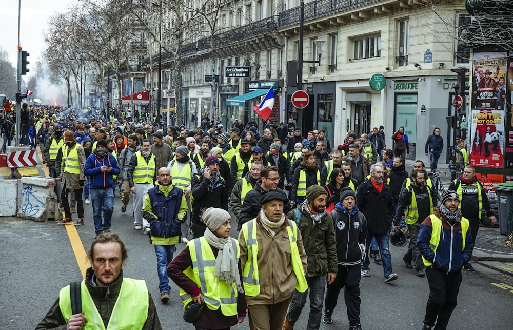 people walking on road during daytime