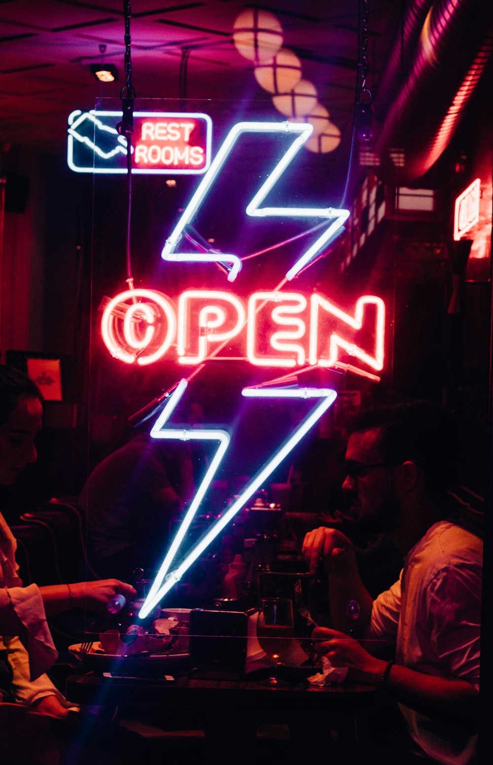 blue and red Open neon light signage