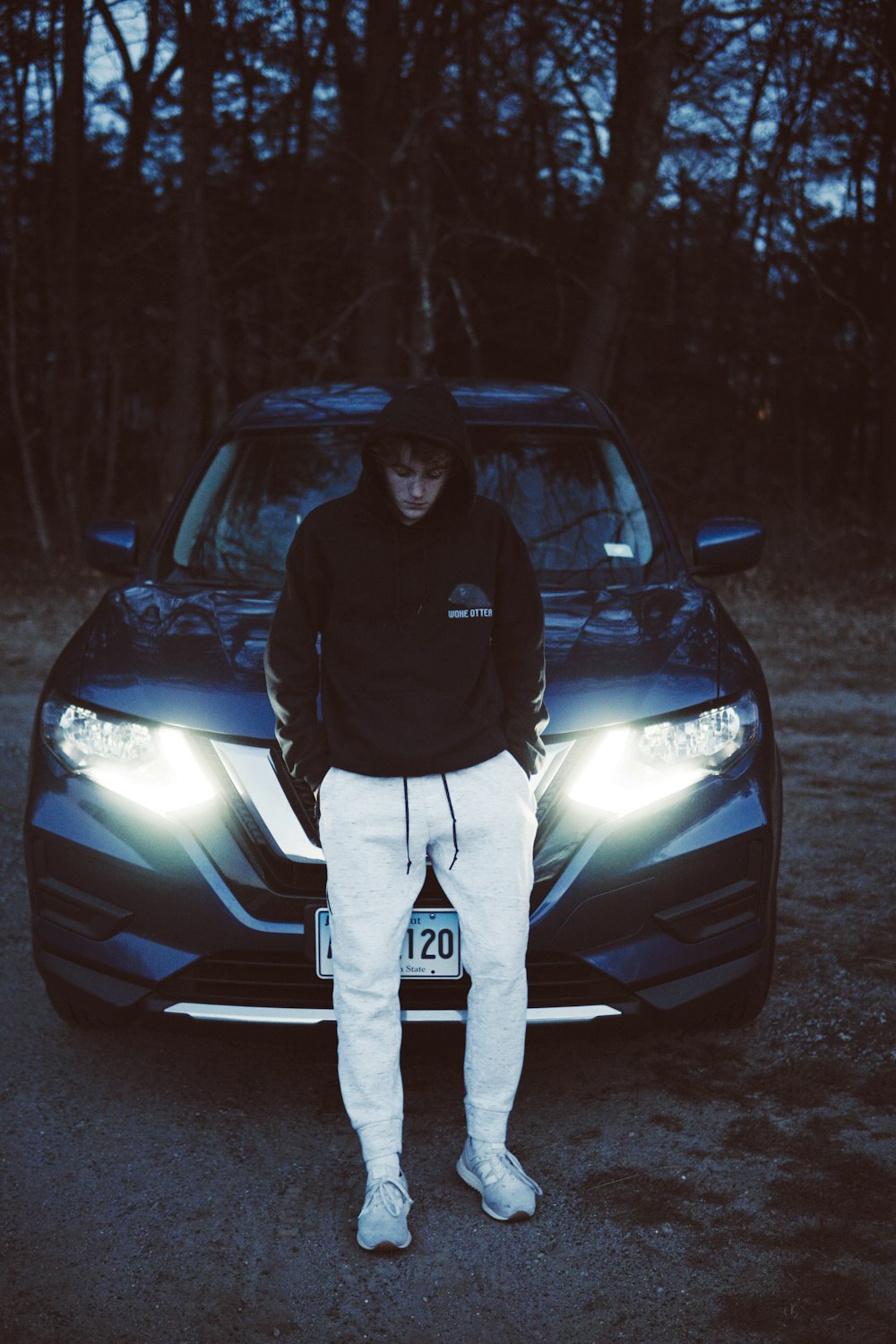 man standing in front of vehicle