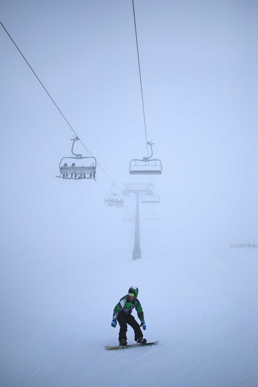 man beside cable cart