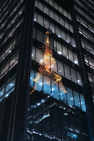 mirror photography of Eiffel Tower