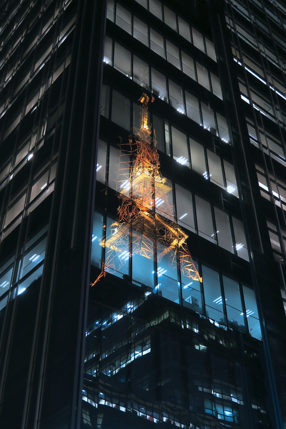 mirror photography of Eiffel Tower