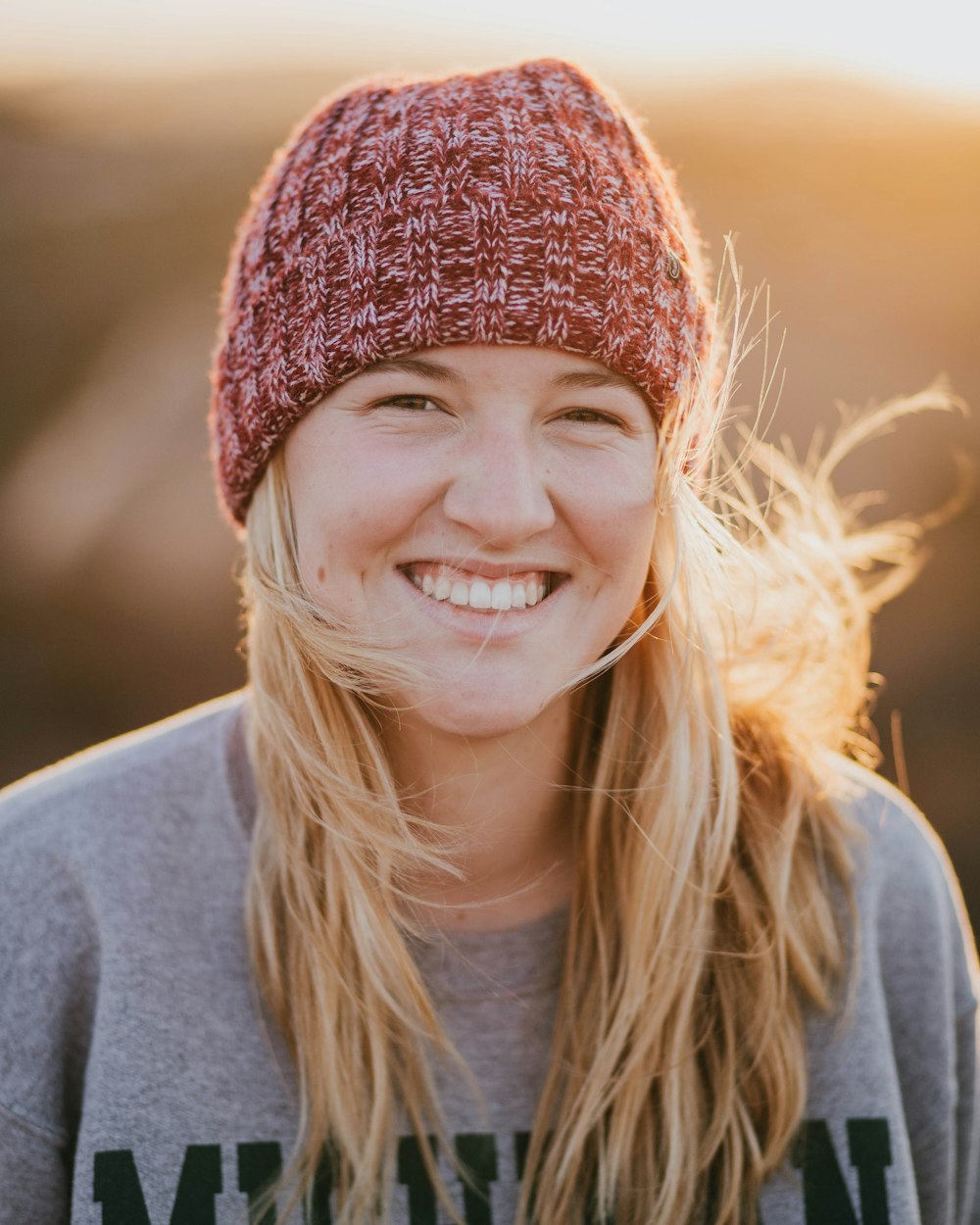 woman wearing red knit cap