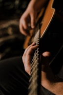 person playing guitar