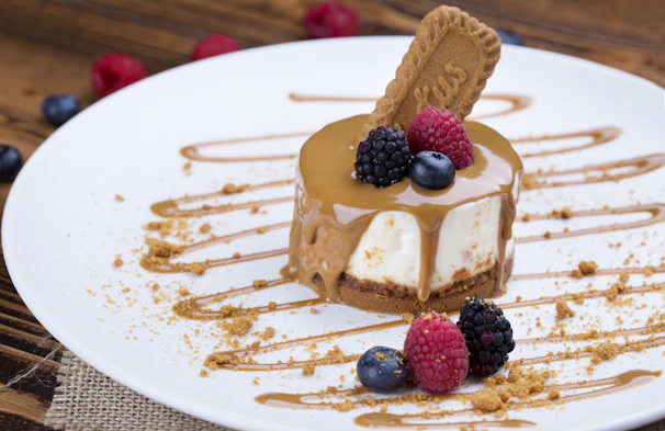 Dessert shot of gula melaka cheesecake topped with a drizzle of palm sugar syrup.