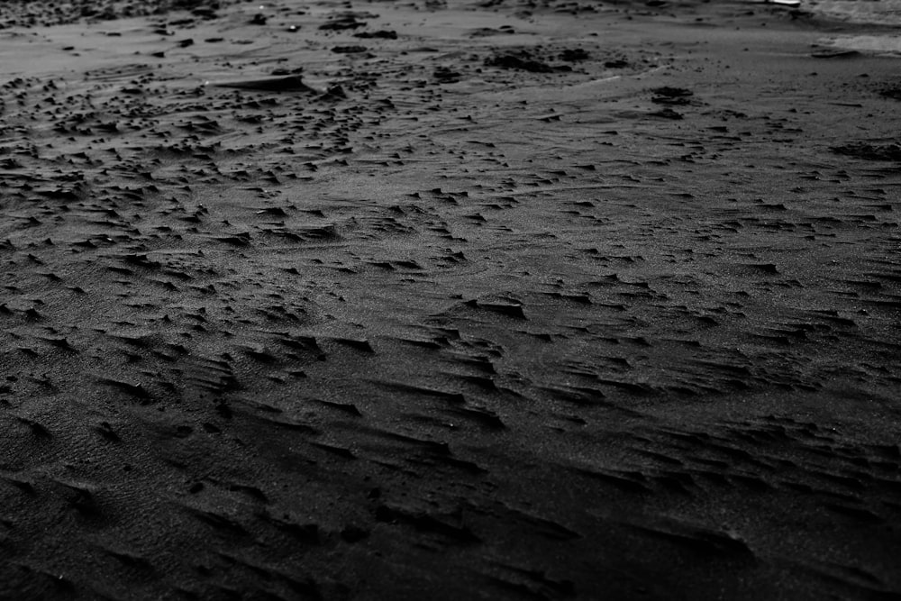 grayscale photo of sand