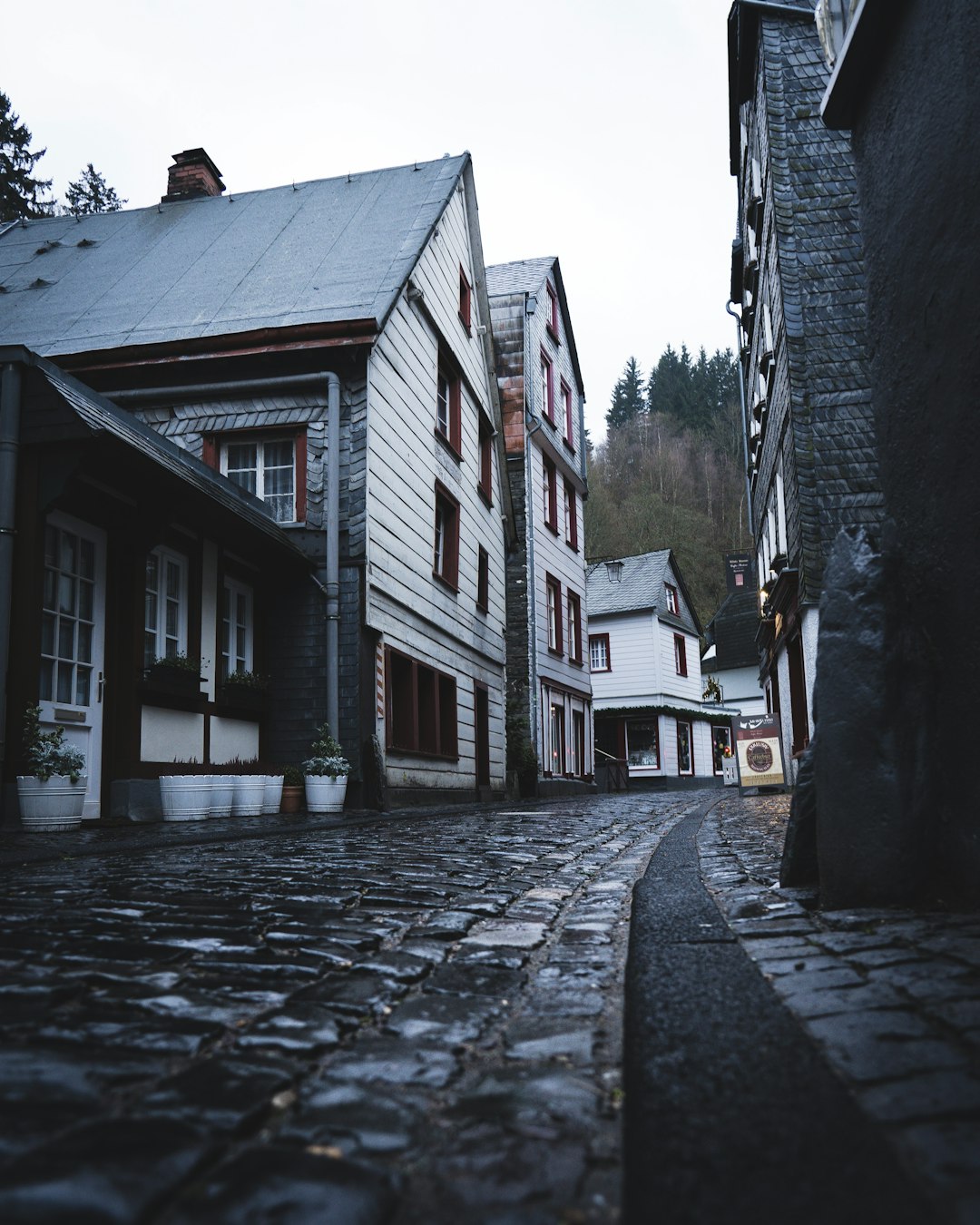empty narrow street during daytime