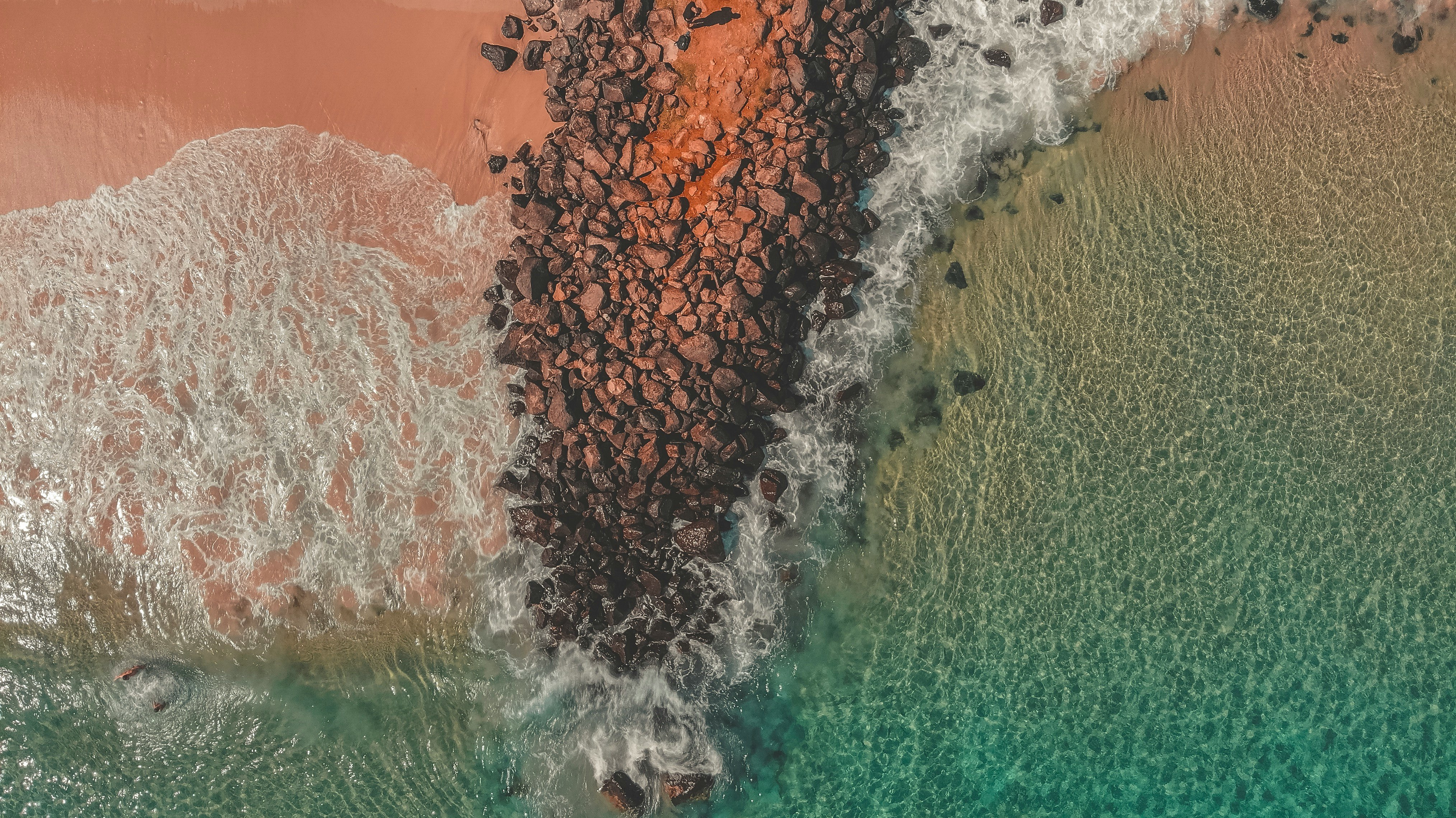 sea water crashing in beach sand