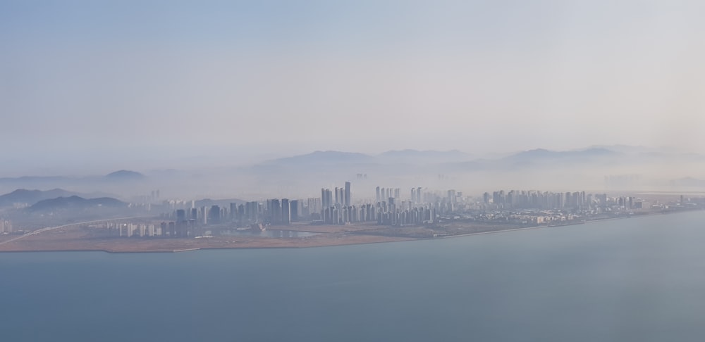 aerial photography of buildings near sea