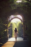 woman walking alone on pathway
