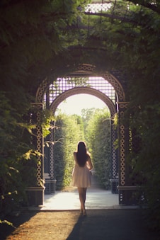 woman walking alone on pathway