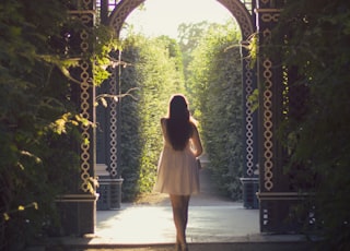 woman walking alone on pathway