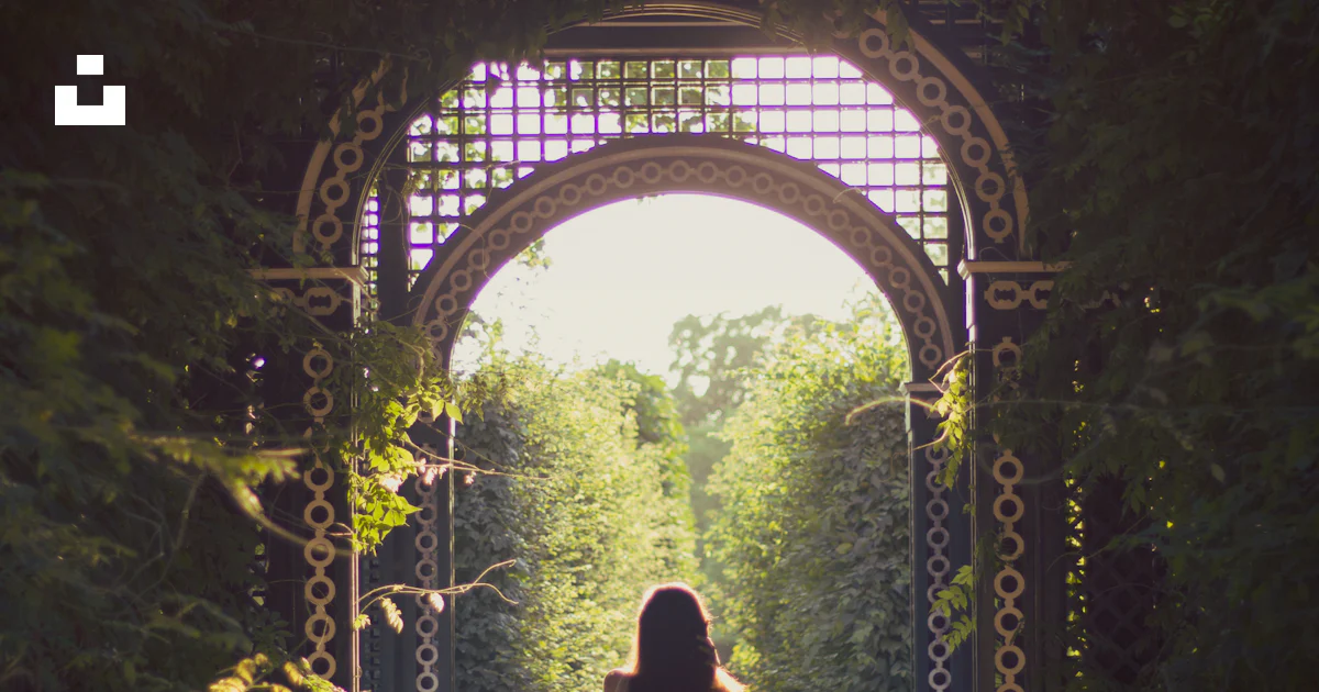 Woman walking alone on pathway photo – Free Woman Image on Unsplash