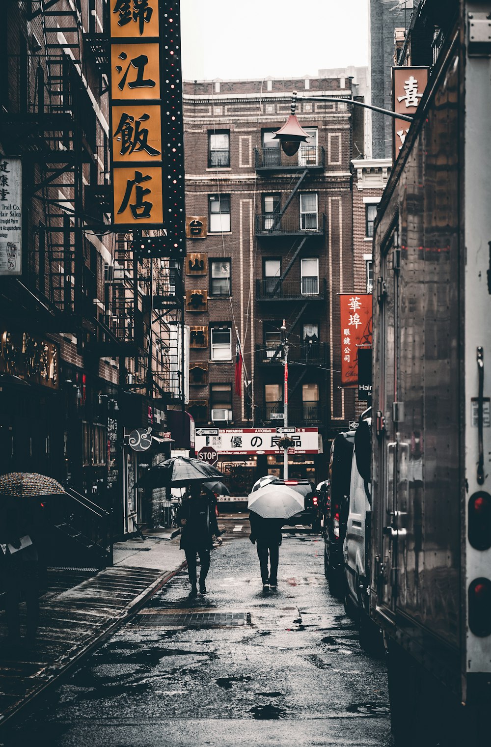 person walking on street during day time