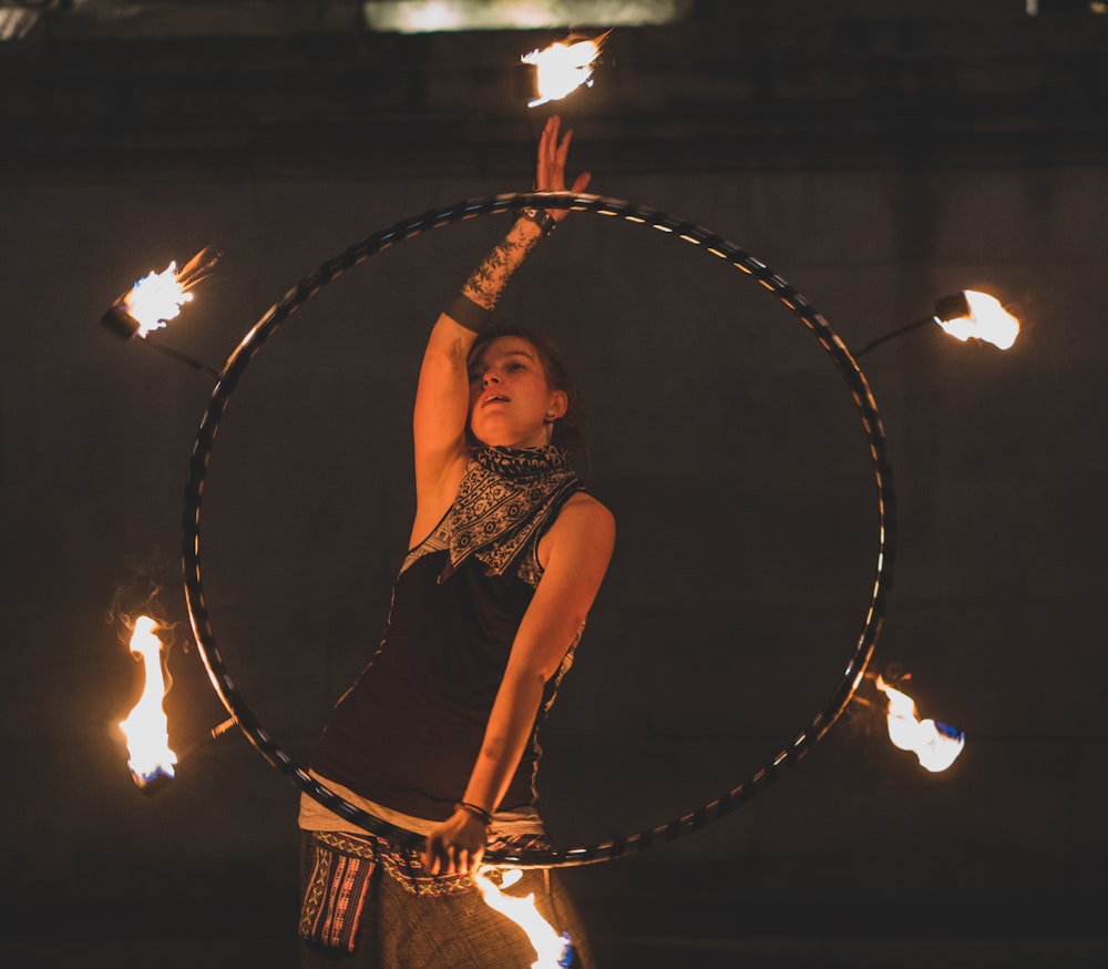 woman fire dancing at night
