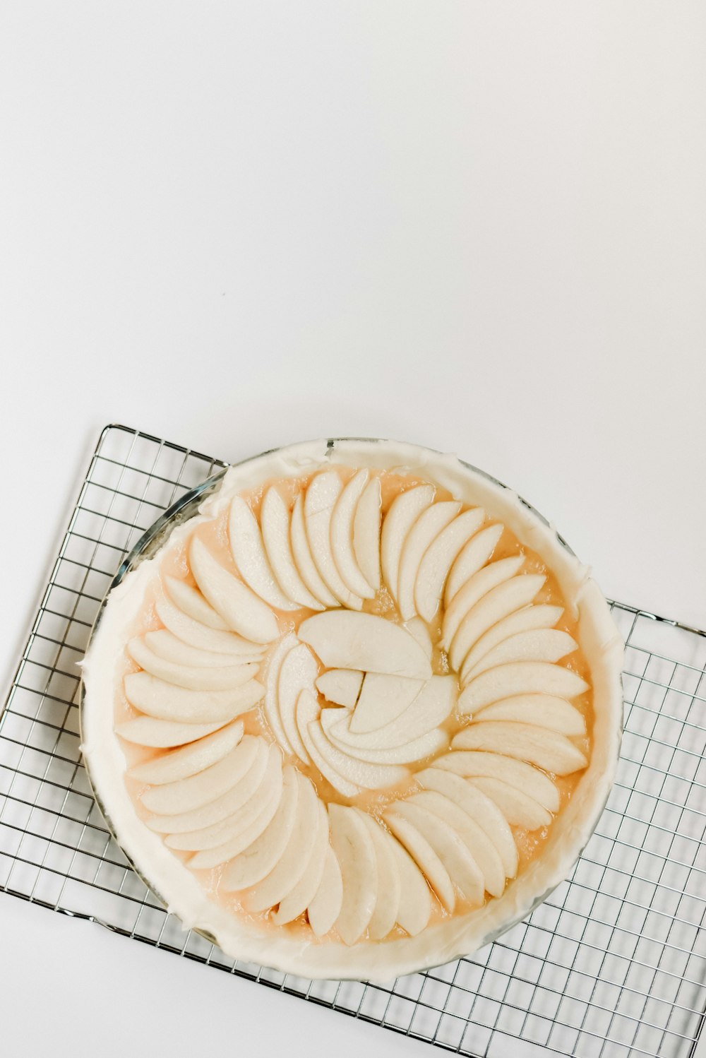 white ceramic plate on white surface