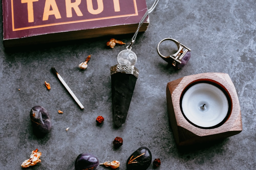 assorted-color stones and pillar cabine on gray surface