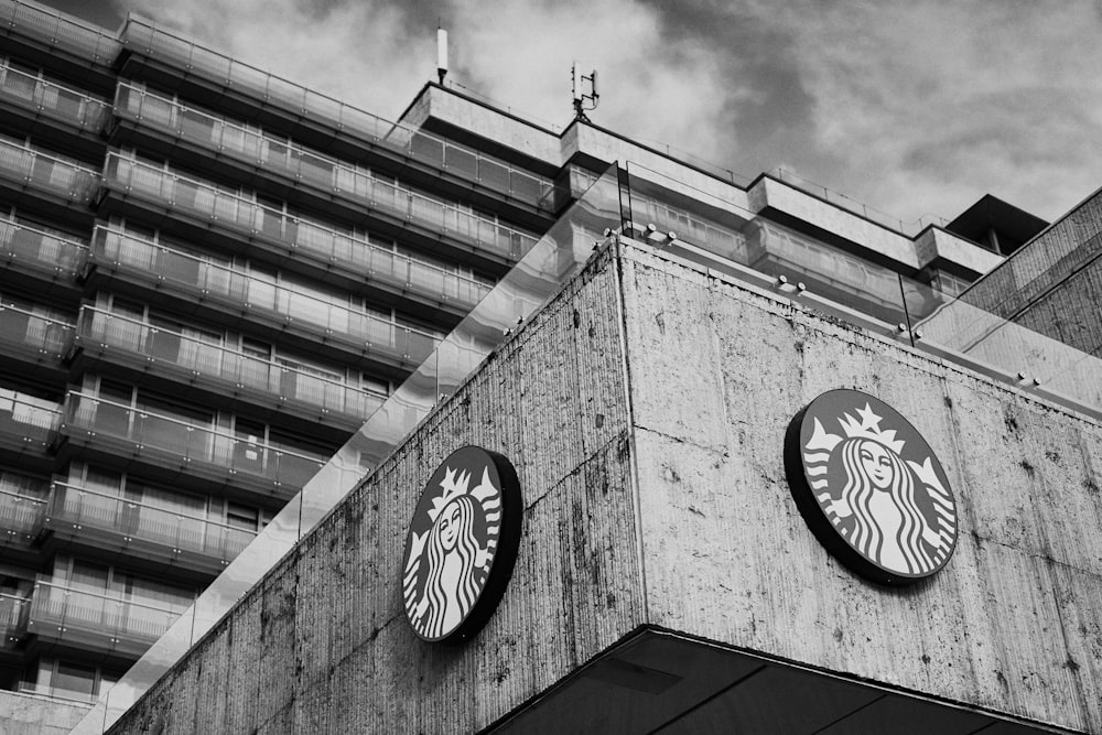 grayscale photo of Starbucks building