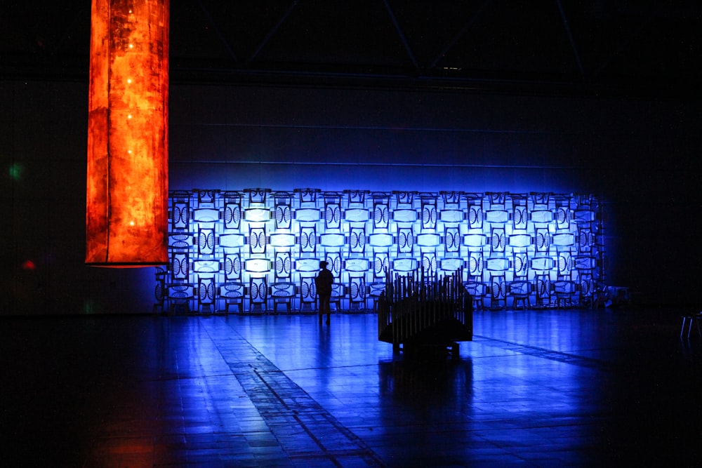 silhouette of person standing inside building