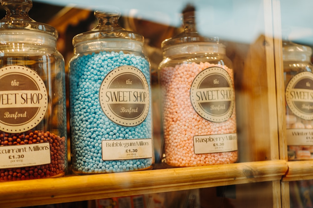 Sweet Shop jars on wooden shelf