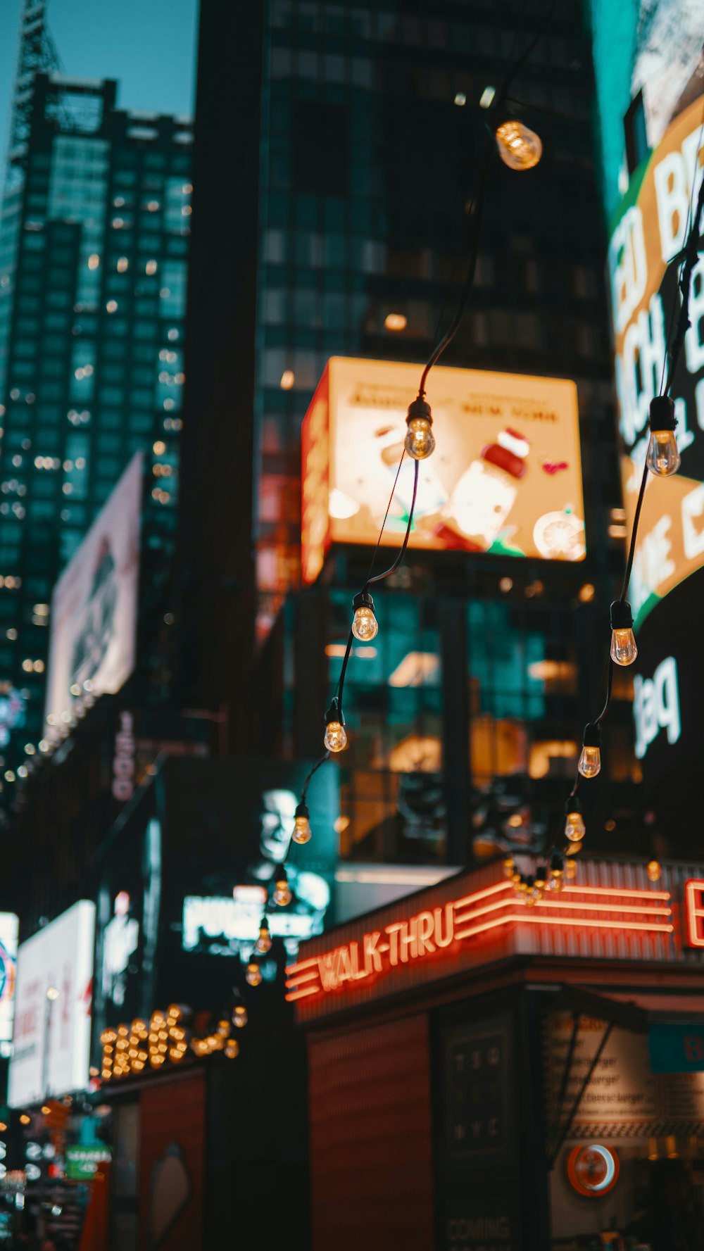 selective focus photography of buildings during nighttime