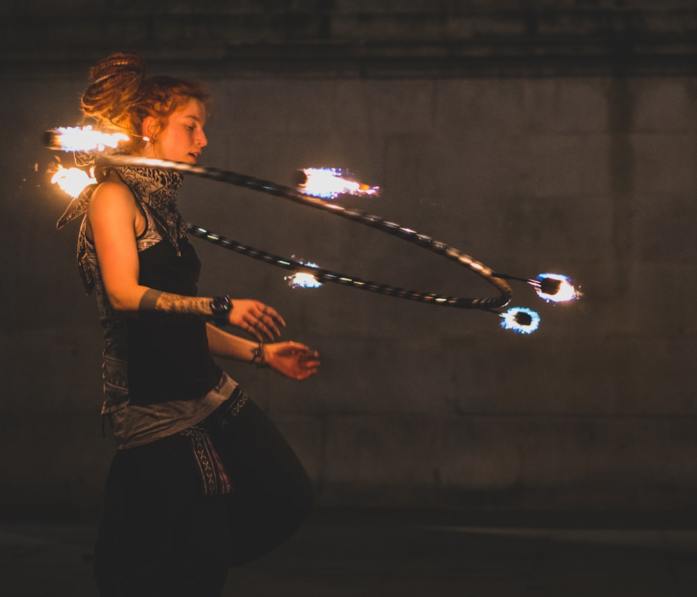 woman doing hola hoop on neck