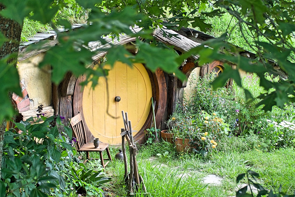 photo of two brown wooden houses