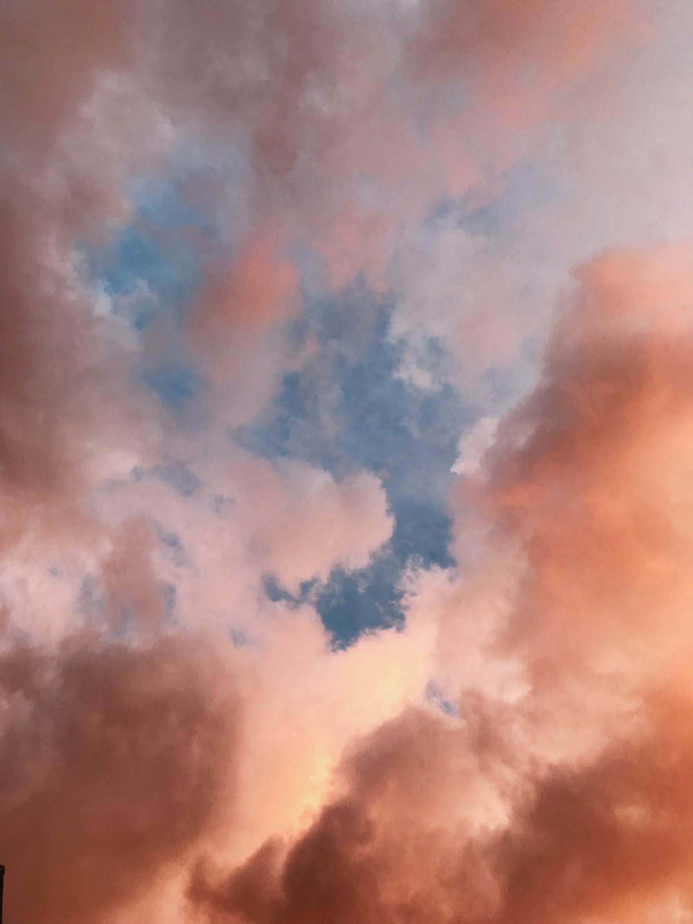 white clouds during golden hour