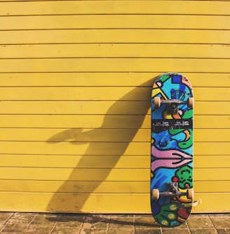 photo of blue multicolored skateboard