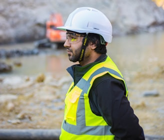 man wearing safety suit standing outdoors