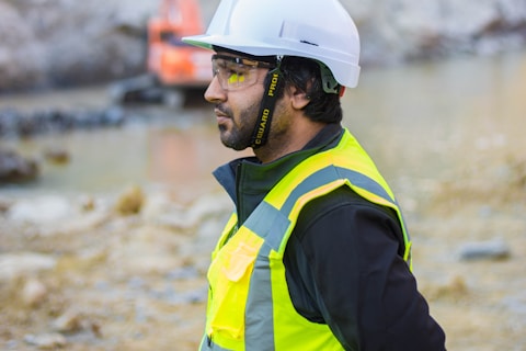 man wearing safety suit standing outdoors