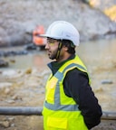 man wearing safety suit standing outdoors