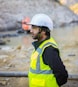 man wearing safety suit standing outdoors