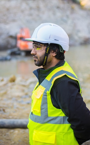 man wearing safety suit standing outdoors