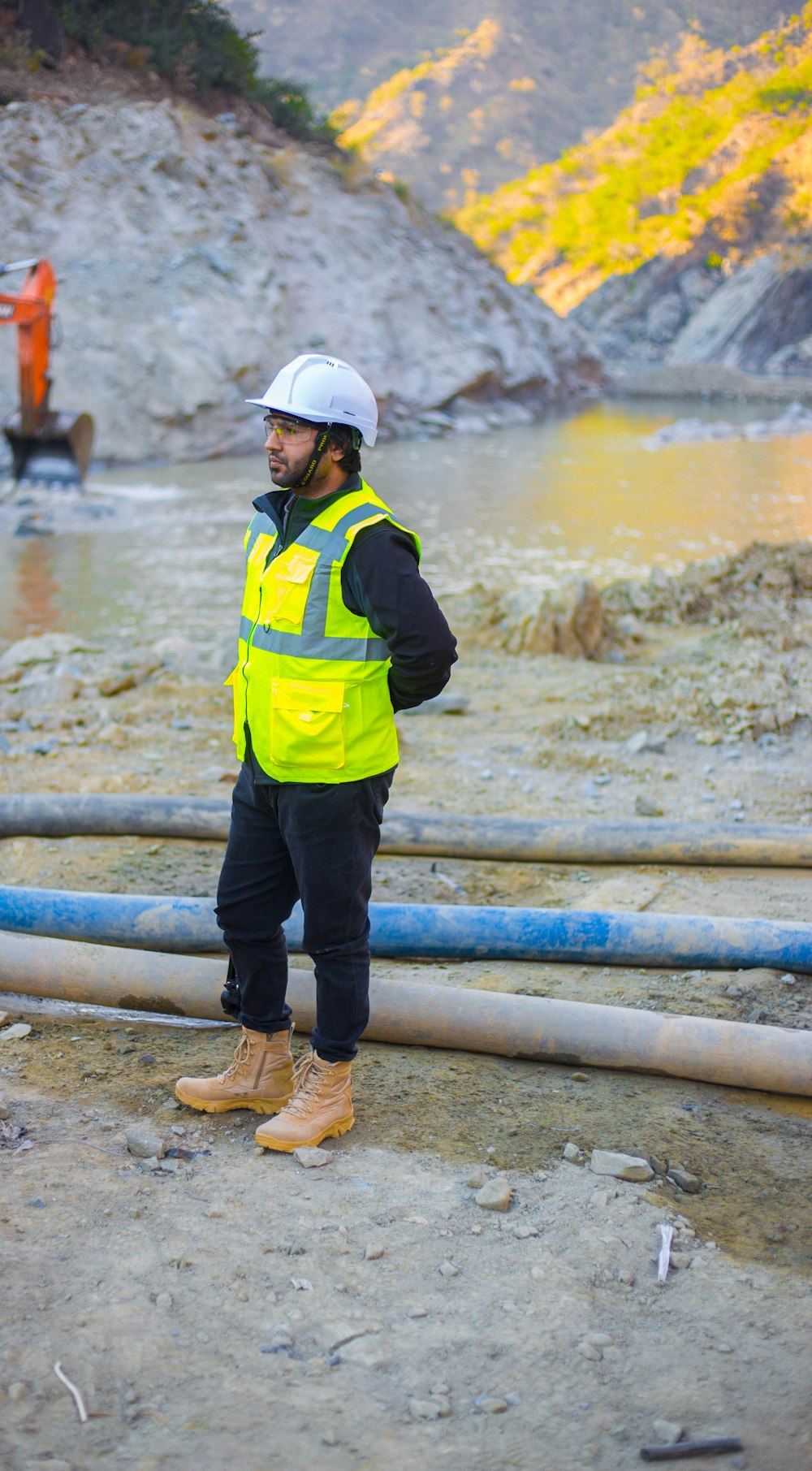 man standing near body of water