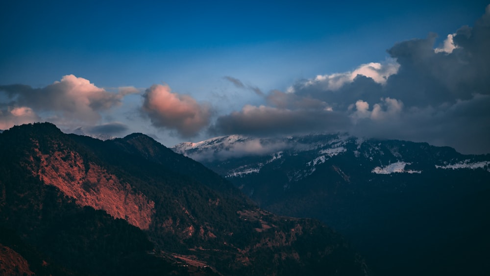 dark clouds above mountain