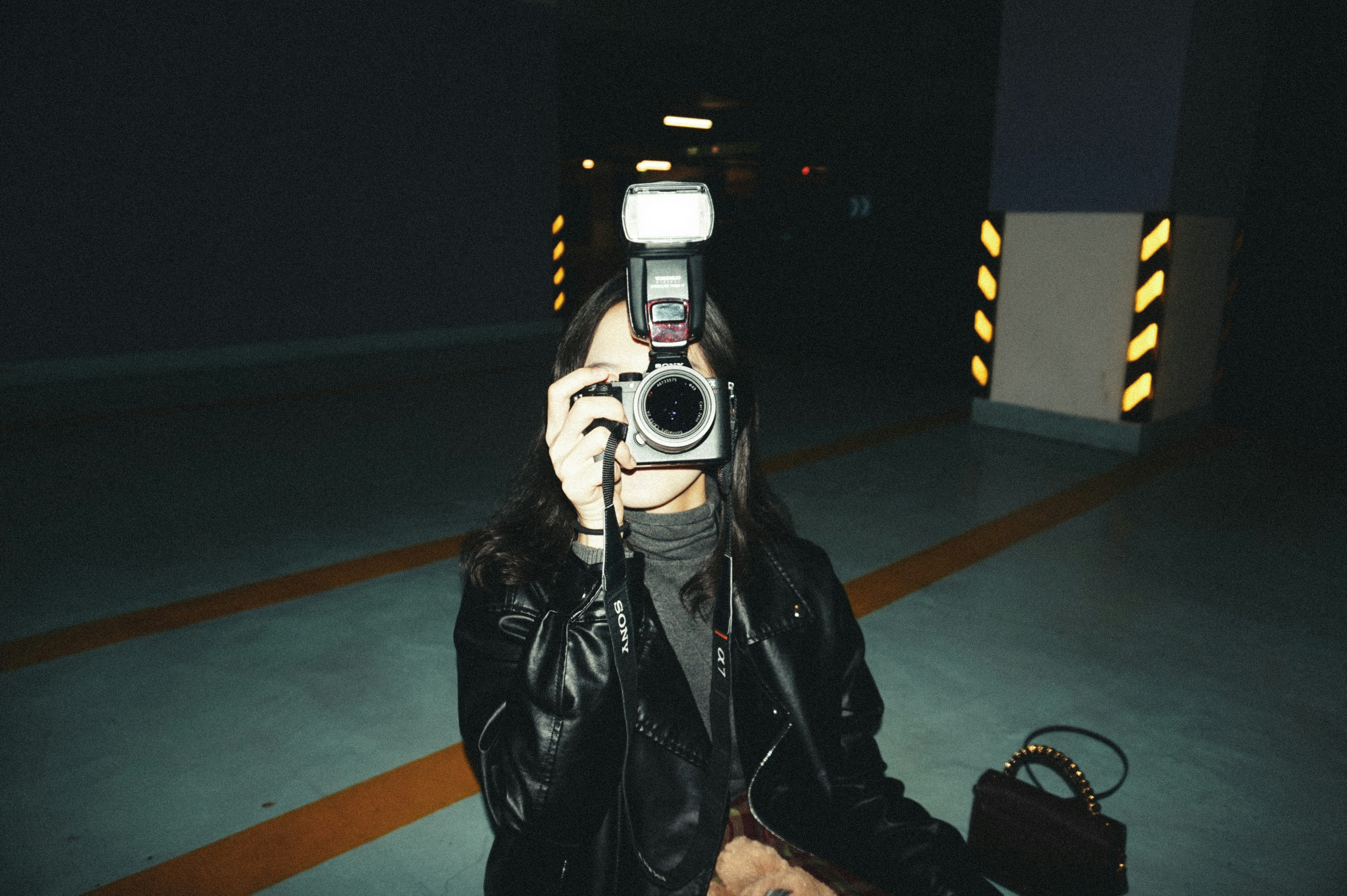 woman using DSLR camera