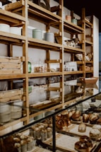 A cozy bakery counter displaying freshly baked millet cookies in rustic packaging.