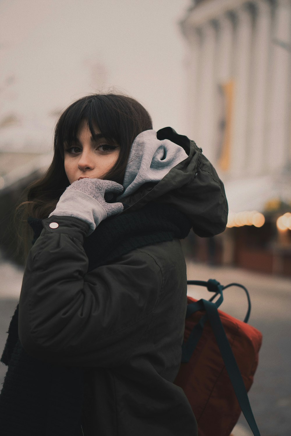 woman wearing black hooded jacket