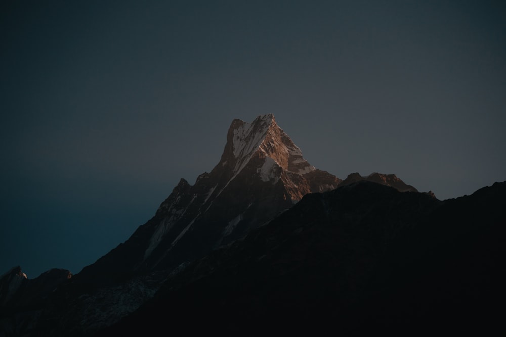 brown mountain during blue hour