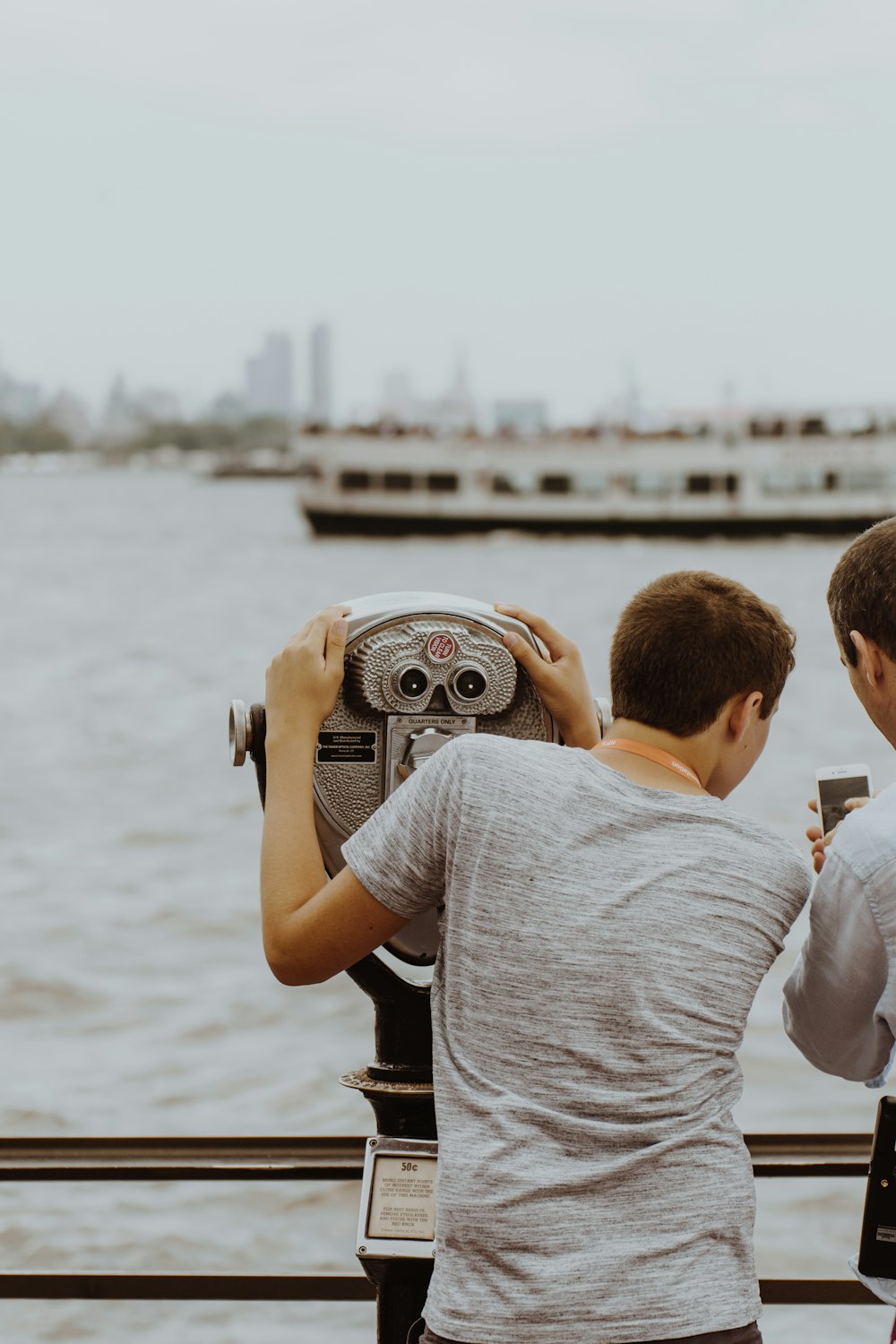 man using binoculars