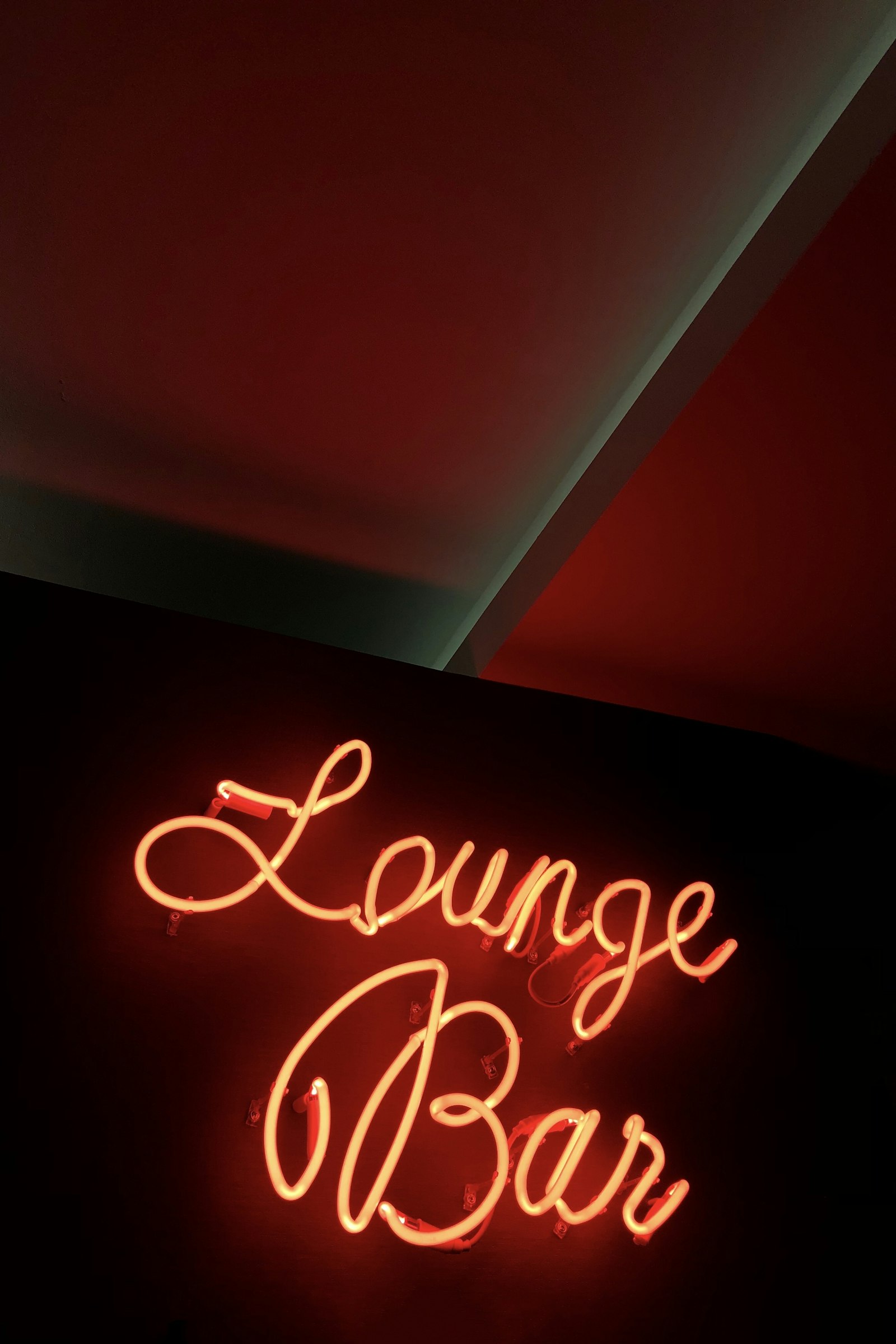 Apple iPhone X sample photo. Lighted lounge bar signage photography