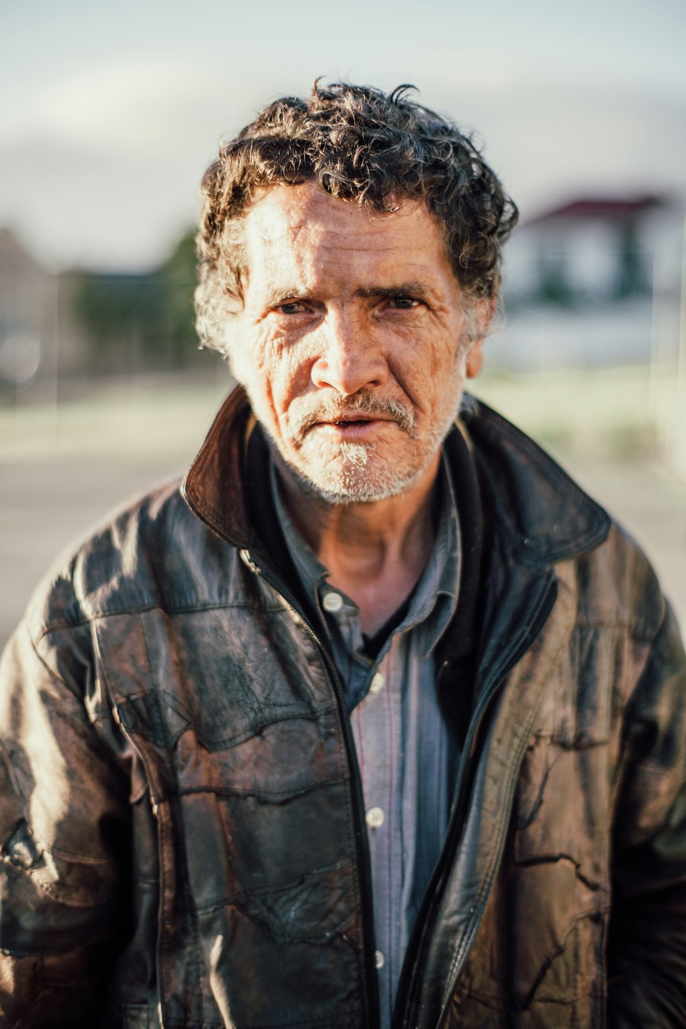 man wearing black zip-up jacket