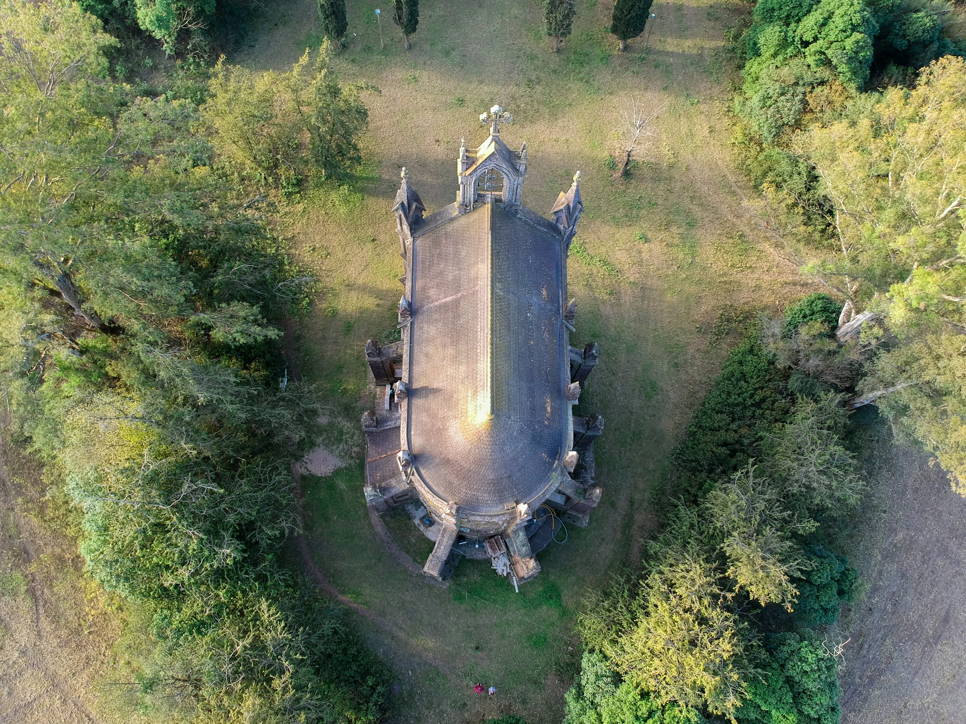 woman wearing yellow long-sleeved dress under white clouds and blue sky during daytime