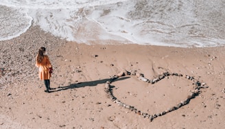 woman standing in the seashore