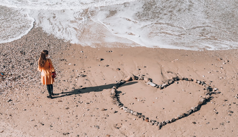 woman standing in the seashore